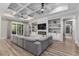 Spacious living room features a coffered ceiling, fireplace, and built-in shelves for storage at 1131 East Isle Of Palms, Myrtle Beach, SC 29579