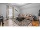 Comfortable living area with a leather sofa, ottoman, and patterned rug at 1131 East Isle Of Palms, Myrtle Beach, SC 29579
