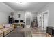 Open living area with desk, stairs to second floor and door to bathroom at 1131 East Isle Of Palms, Myrtle Beach, SC 29579