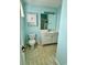 Bathroom featuring a white vanity, sink, toilet, medicine cabinet, and tiled floor at 118 Retreat Pl., Little River, SC 29566