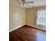 This bedroom features wood-look floors, ceiling fan, neutral walls, and a window at 118 Retreat Pl., Little River, SC 29566