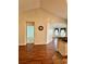 Spacious open floorplan showing hardwood floors that connect living areas and kitchen features at 118 Retreat Pl., Little River, SC 29566