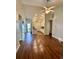 Open-concept living space with hardwood floors seamlessly connecting the living room to the kitchen at 118 Retreat Pl., Little River, SC 29566