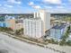 Aerial view showcasing the high rise resort complex with a beach front view at 1207 S Ocean Blvd. # 20109, Myrtle Beach, SC 29577