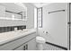 Stylish bathroom featuring a modern vanity, decorative tile flooring and built in shelving at 1207 S Ocean Blvd. # 20109, Myrtle Beach, SC 29577