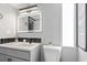 Modern bathroom with decorative tile flooring and a sleek, illuminated mirror at 1207 S Ocean Blvd. # 20109, Myrtle Beach, SC 29577