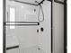 Contemporary shower with sleek glass doors, a shower bench and black fixtures at 1207 S Ocean Blvd. # 20109, Myrtle Beach, SC 29577