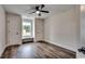 Bedroom featuring a window seat, ceiling fan, and generous closet space at 142 Temple Dr., Aynor, SC 29511