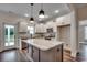 Stylish kitchen with modern island, stainless appliances, and plenty of cabinet space at 142 Temple Dr., Aynor, SC 29511