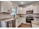 Well-equipped kitchen with stainless steel appliances, granite countertops, and ample storage at 142 Temple Dr., Aynor, SC 29511