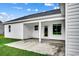 Covered patio area with concrete floor, perfect for outdoor relaxation and entertaining at 142 Temple Dr., Aynor, SC 29511