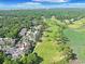 Aerial view of the complex with golf course views and mature trees at 1551 Spinnaker Dr. # 5913, North Myrtle Beach, SC 29582