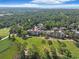 Aerial view of condo building with golf course and lush landscaping at 1551 Spinnaker Dr. # 5913, North Myrtle Beach, SC 29582