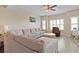 Cozy living room with hardwood floors, plantation shutters on the window, and comfortable seating at 1551 Spinnaker Dr. # 5913, North Myrtle Beach, SC 29582