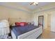 Spacious main bedroom with a plush bed frame and lots of natural light at 1551 Spinnaker Dr. # 5913, North Myrtle Beach, SC 29582