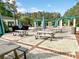 Outdoor picnic area featuring shaded tables on a brick patio at 1551 Spinnaker Dr. # 5913, North Myrtle Beach, SC 29582
