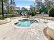 Relaxing jacuzzi with chairs and landscaped grounds with stairs to a clubhouse at 1551 Spinnaker Dr. # 5913, North Myrtle Beach, SC 29582