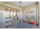 Enjoy this screened porch with sliding glass doors and comfortable seating at 1551 Spinnaker Dr. # 5913, North Myrtle Beach, SC 29582