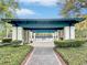 Exterior entrance to the Tennis Center with a view of the tennis courts at 1551 Spinnaker Dr. # 5913, North Myrtle Beach, SC 29582