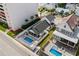 An elevated aerial view captures the backyard pool area, highlighting its layout within the surrounding landscape at 1616 S Ocean Blvd., North Myrtle Beach, SC 29582