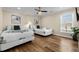 Bright bedroom with two twin beds, ceiling fan, and natural light creating a cozy and comfortable space at 1616 S Ocean Blvd., North Myrtle Beach, SC 29582