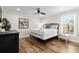 Cozy bedroom featuring a queen bed, stylish decor, and ample natural light, creating a comfortable retreat at 1616 S Ocean Blvd., North Myrtle Beach, SC 29582