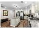 Bright kitchen with stainless steel appliances, granite countertops, a central island, and ample cabinet space at 1616 S Ocean Blvd., North Myrtle Beach, SC 29582