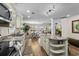 Open concept kitchen with stainless steel appliances, granite countertops, and ample counter space at 1616 S Ocean Blvd., North Myrtle Beach, SC 29582