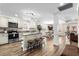 Spacious open-concept kitchen with a large island, modern appliances, and stylish bar stools at 1616 S Ocean Blvd., North Myrtle Beach, SC 29582