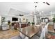 Open living space connecting the kitchen, dining area, and living room, with modern decor and finishes at 1616 S Ocean Blvd., North Myrtle Beach, SC 29582