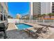 Backyard pool with lounge chairs, ideal for relaxation and entertaining with nearby hotels at 1616 S Ocean Blvd., North Myrtle Beach, SC 29582