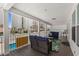 Inviting covered porch with comfortable seating, offering a relaxing outdoor space with a view of the surroundings at 1616 S Ocean Blvd., North Myrtle Beach, SC 29582