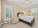 Comfortable bedroom with lots of natural light, a ceiling fan, and neutral tones at 175 Summer Wind Loop, Murrells Inlet, SC 29576