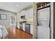 Well-designed kitchen and features a tucked-away laundry setup at 175 Summer Wind Loop, Murrells Inlet, SC 29576