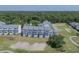 Waterfront condos overlooking golf course and lush green landscaping from above at 1912 Goose Creek Rd. Sw # 4302, Ocean Isle Beach, NC 28469