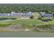 Scenic aerial view of waterfront condo community with golf course and lagoon at 1912 Goose Creek Rd. Sw # 4302, Ocean Isle Beach, NC 28469
