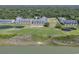 Scenic aerial view of waterfront condo community with golf course and lagoon at 1912 Goose Creek Rd. Sw # 4302, Ocean Isle Beach, NC 28469