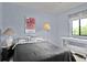 Comfortable bedroom with gray accents, complemented by natural light and a cozy atmosphere at 1912 Goose Creek Rd. Sw # 4302, Ocean Isle Beach, NC 28469