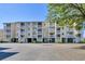 Coastal condo featuring multiple balconies, ample parking, and convenient ground-level covered parking at 1912 Goose Creek Rd. Sw # 4302, Ocean Isle Beach, NC 28469
