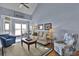 Cozy living room featuring comfortable seating, a neutral color scheme, and bright, airy lighting at 1912 Goose Creek Rd. Sw # 4302, Ocean Isle Beach, NC 28469