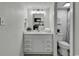 Bright bathroom with vanity, updated mirror lights, and toilet with tiled flooring at 2001 S Ocean Blvd. # 721, Myrtle Beach, SC 29577