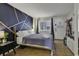 Inviting bedroom featuring a queen-size bed, modern decor, and ample natural light at 2001 S Ocean Blvd. # 721, Myrtle Beach, SC 29577