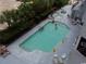 Aerial view of a condo pool with swimmers and lounge chairs at 2001 S Ocean Blvd. # 721, Myrtle Beach, SC 29577