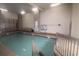 Indoor pool with benches and basketball hoop at 2001 S Ocean Blvd. # 721, Myrtle Beach, SC 29577