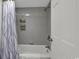 Shower-tub combo with grey tiling and modern showerhead at 2001 S Ocean Blvd. # 721, Myrtle Beach, SC 29577