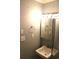 Bathroom features a single vanity sink, a mirror and seashell wallpaper at 201 76Th Ave. N # E3, Myrtle Beach, SC 29577