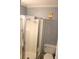 Bathroom features a shower, a toilet and walls with seashell wallpaper at 201 76Th Ave. N # E3, Myrtle Beach, SC 29577