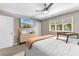 Charming bedroom with ceiling fan, natural light, and decorative accents at 210 Double Eagle Dr. # B-2, Surfside Beach, SC 29575
