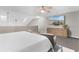 Tranquil bedroom with a ceiling fan, beach-scene TV, and comfortable seating at 210 Double Eagle Dr. # B-2, Surfside Beach, SC 29575