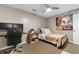 This bedroom features a desk, bed and wall art at 210 Double Eagle Dr. # B-2, Surfside Beach, SC 29575